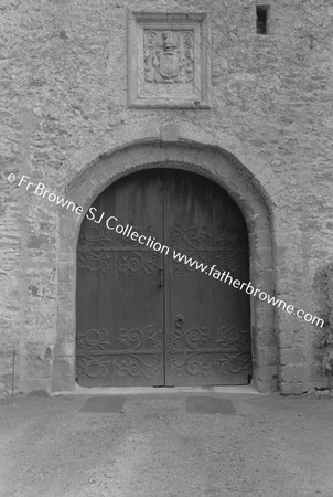 LISMORE CASTLE  ENTRANCE TO COURTYARD WITH CELTIC CARVINGS